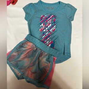 Blue Graphic Tee sketchers and Colorful Shorts play days outfit 18m girl